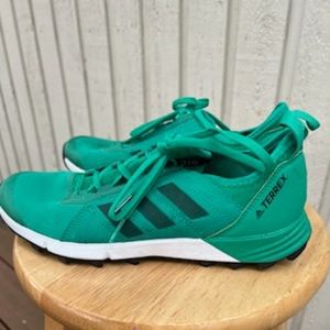 Green adidas terrex running shoe